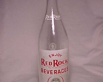 1952 Enjoy Red Rock Beverages Lowville, N.Y., clear glass with Red & White ACL Painted Label Crown Top 28 oz Soda Bottle, Back Bar Decor