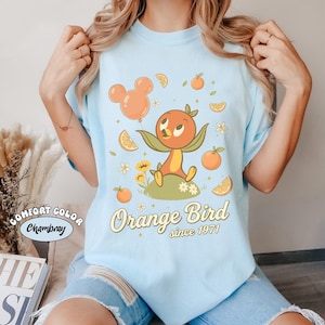 Vintage Disney Orange Fågelskjorta, Epcot Flower and Garden Festival 2026 T-shirt, Retro Walt Disney World Citrus Bird-skjortor, Disneyland-resa Chambray/Light Blue