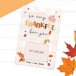 May include: A fall-themed gift card with the words "so very THANKFUL for you" in a playful font. The card features a pumpkin illustration and space for a gift card, with the text "GIFT CARD HERE" and "from: Liam James".