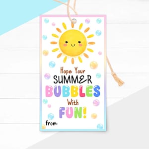 May include: A rectangular gift tag with a cheerful yellow sun illustration and the text "Hope Your SUMMER BUBBLES With FUN!". The tag features colorful bubbles and a space to write "from:". It is tied with a natural twine.