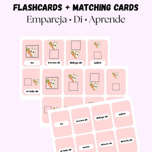 May include: Pink flashcards and matching cards with English and Spanish text. The cards feature a cartoon bunny holding a carrot and vocabulary words like "en", "encima de", and "debajo de".