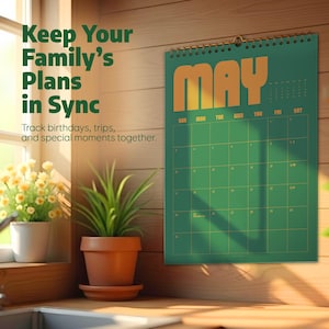 May include: A green wall calendar for May with gold lettering and a spiral binding. The calendar is hanging on a wooden wall. Text on the calendar reads "Keep Your Family's Plans in Sync".