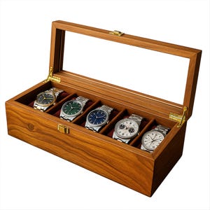 May include: A wooden watch display case with a glass lid, displaying five wristwatches with different coloured faces and metal straps. The case is made of warm-toned wood and has a hinged lid with a brass clasp and a red velvet interior.