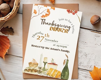 May include: Thanksgiving dinner invitation on a white wooden surface, surrounded by fall foliage, walnuts, and a basket. The invitation reads "Thanksgiving Dinner" with the date and time.