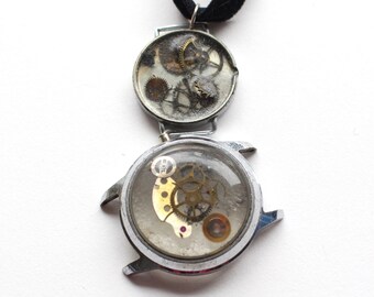 Upcycled vintage watch pendant with resin antique clock parts cogs handmade steampunk jewellery silver black ribbon velvet suffolk upcycling