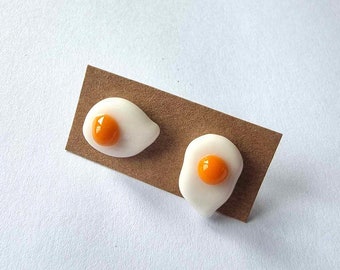 Lampworked glass fried egg earring studs yolk white yellow fun jewellery breakfast handmade in Bristol flameworked glassblowing borosilicate