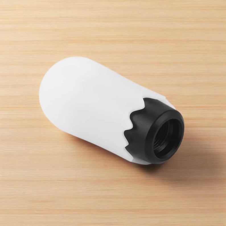 Bottom view of ghost shift knob showing threaded insert for universal adapters, white Halloween manual shift knob ready to mount on a 6 speed gear shifter, JDM style weighted shift knob compatible with most manual transmission cars, custom ghost gear knob upgrade for tuners, drift builds, hot rods and stance cars, also suitable as a sim racing and gaming simulator shifter knob for iRacing rigs and spooky themed racing cockpits.