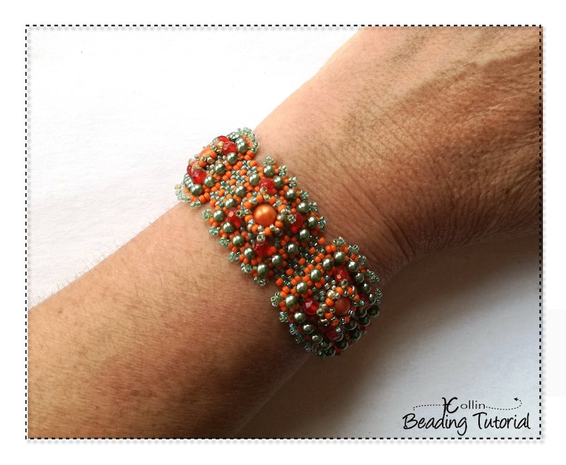 May include: A beaded bracelet with orange, red, and green beads. The bracelet is worn on a person's wrist. The beads are arranged in a pattern with larger orange beads in the center and smaller green beads around the edges. The bracelet is a handmade jewelry item.
