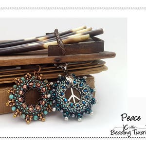May include: Two beaded pendants, one with a peace sign design in blue and silver beads, and the other with a circular design in copper, turquoise, and brown beads. The pendants are on a wooden surface with the text "Peace Collin Beading Tutorial" below.