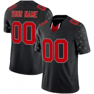 May include: Black football jersey with red accents and the number "00" on the front and back. The jersey has the text "YOUR NAME" on the back. The sleeves feature a subtle pattern of small, gray leaf shapes.