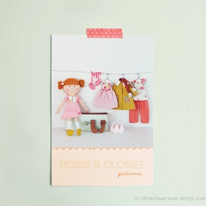 May include: A set of doll clothes patterns for a doll named Posie. The patterns include a pink dress, a yellow jacket, a red and white dress, and a pair of red pants. The patterns are available on Etsy at charlaanne.etsy.com.