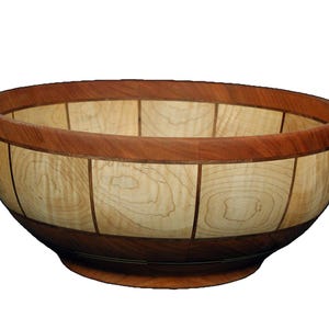 May include: A wooden bowl with a light brown and dark brown checkered pattern. The bowl is made of wood and has a smooth, rounded surface.