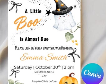 May include: A white baby shower invitation card featuring a cartoon ghost wearing a black witch hat with gold stars, a smiling orange pumpkin, black bows, spiderwebs, and the text A Little Boo is Almost Due, honouring Emma Smith on 30th October.