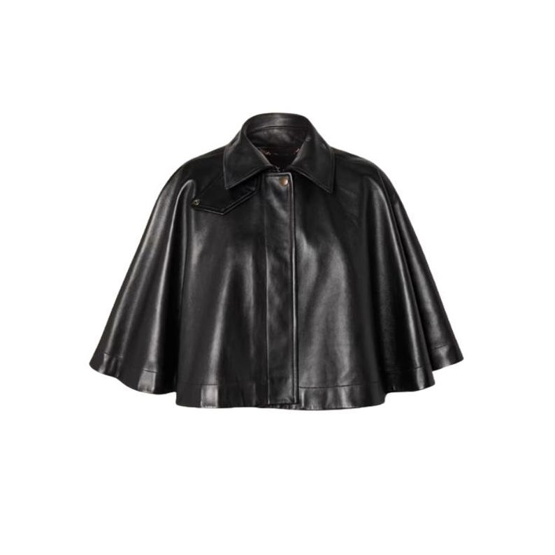 May include: A black leather cape with a collar and button closure. The cape has a classic design and a smooth texture. The garment is displayed against a white background.