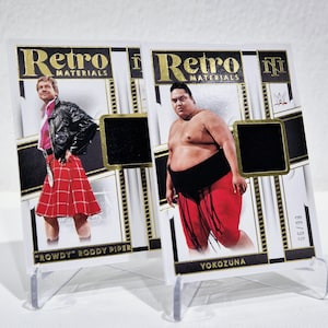 2024 Panini National Treasures WWE Retro Materials Yokozuna & Rowdy Piper /99 and Materials Sycho Sid /25