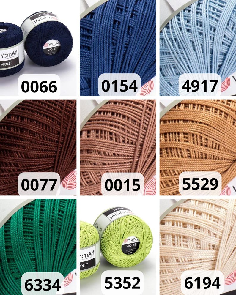 May include: A selection of YarnArt Violet yarn skeins in diverse colours. The image shows skeins in navy blue, light blue, brown, green, and beige. Each skein is labelled with a colour code, including 0066, 0154, 4917, 0077, 0015, 5529, 6334, 5352, and 6194.
