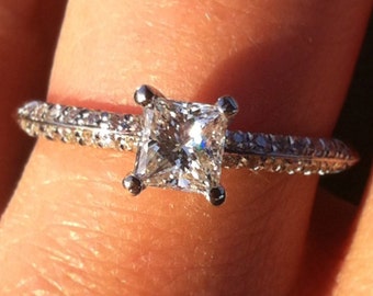 Engagement Ring - Princess Cut diamond 0.76 crt, 18k white gold.