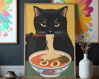 May include: A framed art print featuring a black cat eating ramen noodles with chopsticks. The cat has yellow eyes and is set against a yellow background. The ramen bowl is white and blue with red broth, eggs, and green garnish.