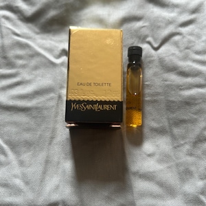 Yves Saint Laurent Champagne sin nombre edición limitada botella en blanco 1,2 ml eau de toilette vintage