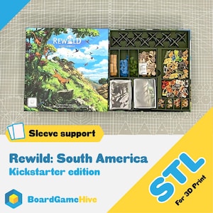 May include: A board game box set, titled "Rewild: South America," with a landscape illustration. The open box shows game pieces, cards, and storage compartments. Text includes "Kickstarter edition" and "BoardGameHive." The box is designed for 3D printing.