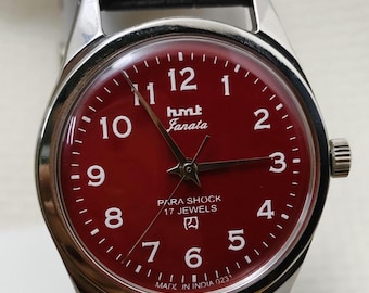 Reloj mecánico de cuerda manual HMT janata con esfera roja y 17 joyas, vintage renovado.