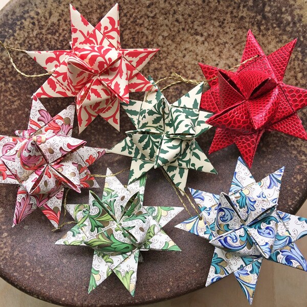 Small Holly, Lizard and Classic Florentine Designs are Scandinavian Folded Holiday Star Ornaments and Party Decor