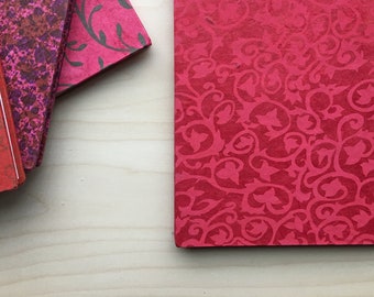 Vibrant Red Print Covers on a White 6x8 Accordion Fold BFK Sketchbook or Alternative Blank Guest Book Album
