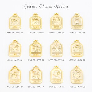 May include: Gold zodiac charm options for necklaces or bracelets. Each charm features a different zodiac sign with its corresponding dates. The charms are arranged in a grid with the zodiac sign and dates listed below each charm.