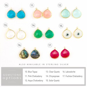 May include: A selection of gemstone options for jewelry making. The gemstones are in the shape of teardrops and are available in a variety of colors, including blue, pink, aqua, green, white, black, and fuchsia. The gemstones are set in gold-toned settings.  10. Blue Topaz 11. Pink Chalcedony 12. Aqua Chalcedony 13. Clear Quartz 14. Chrysoprase 15. Solar Quartz 16. Labradorite 17. Fuchsia Chalcedony