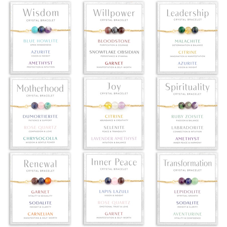 May include: Nine crystal bracelets on white cards, each with a gold chain. The cards display the bracelet's theme, such as "Wisdom" or "Leadership", and the associated gemstones like Amethyst and Citrine. The bracelets are for sale.
