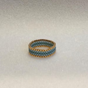 TURQUOISE RING 5: made from miyuki delica beads, combination of opaque and shiny turquoise and metallic beads.