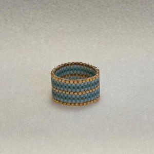 TURQUOISE RING 9: made from miyuki delica beads, combination of opaque and shiny turquoise and metallic beads.