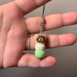 Handmade polymer clay dangos |  Juminocore trinket and phone lanyard.
