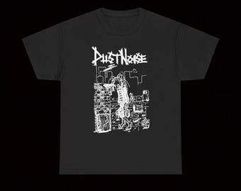 May include: Black t-shirt with a white graphic design. The design features the text "Dust Noise" above a detailed illustration of a figure in a city setting. The artwork has a hand-drawn, sketchy style.