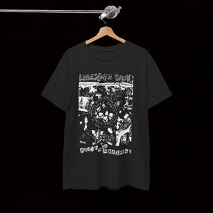 Camiseta con contaminación acústica cataléptica de los muertos vivientes Crust Punk Hardcore Vintage y mensaje Polvo Ruido Pantano Gente Confunde El Gism de los Swankys