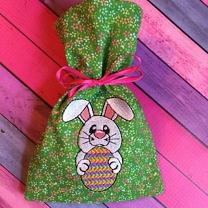 Diseño de máquina de bordar con forma de conejito de Pascua en el aro