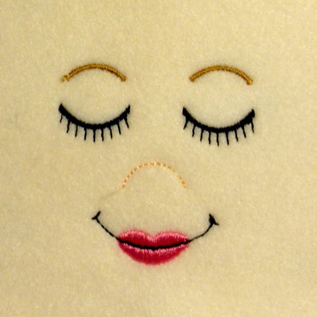 Embroidered Sleeping Doll Face With Full Lip Embroidery Machine Design