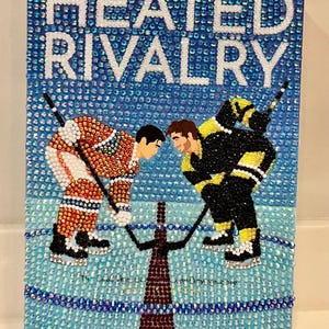 May include: A handmade wooden sign with the text "Welcome" in a handwritten style. The sign is painted white with a distressed finish, and a small green leaf is attached to the top. The sign is designed for indoor or outdoor use.