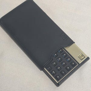Vintage Hewlett-Packard HP-12C wissenschaftlicher programmierbarer Taschenrechner mit Etui Bild 8