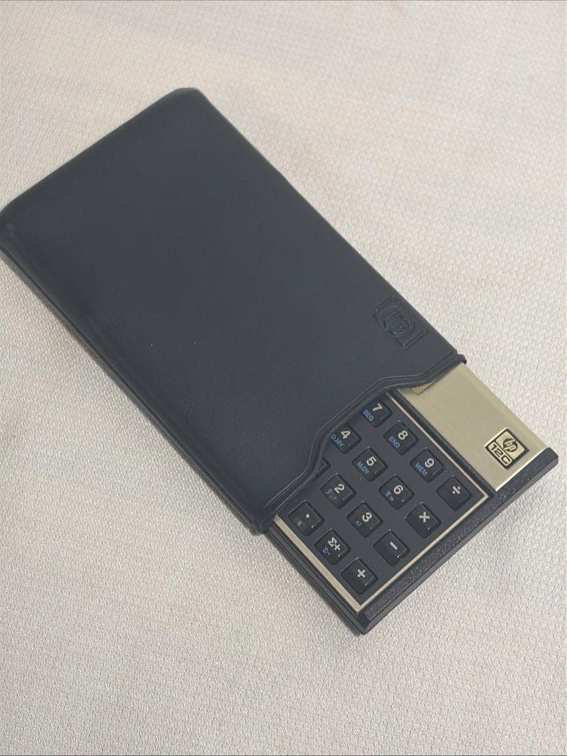 Vintage Hewlett-Packard HP-12C wissenschaftlicher programmierbarer Taschenrechner mit Etui Bild 8