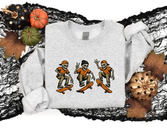 Skeleton Skaters Sweatshirt, Spooky Skater Halloween Sweater, Skateboard Lover Top, Funny Skeleton Skate Jumper, Halloween Gift for Skater