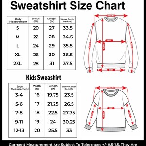 May include: A black and white sweatshirt size chart with measurements in inches. The chart includes adult and kids' sizes, detailing body, width, length, and sleeve center back measurements. Diagrams illustrate where to measure on the garment.