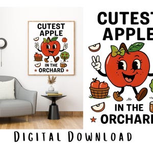 May include: A framed print featuring a cartoon apple character with a green bow, giving peace signs. The text reads "Cutest Apple in the Orchard." The image includes a basket of apples, a tree, and a coffee mug.