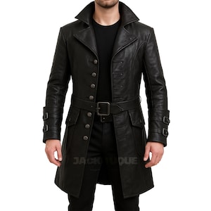 May include: Black leather trench coat with a notched collar, button closure, and a belt at the waist. The coat features multiple pockets and buttoned cuffs. The coat is a classic style.
