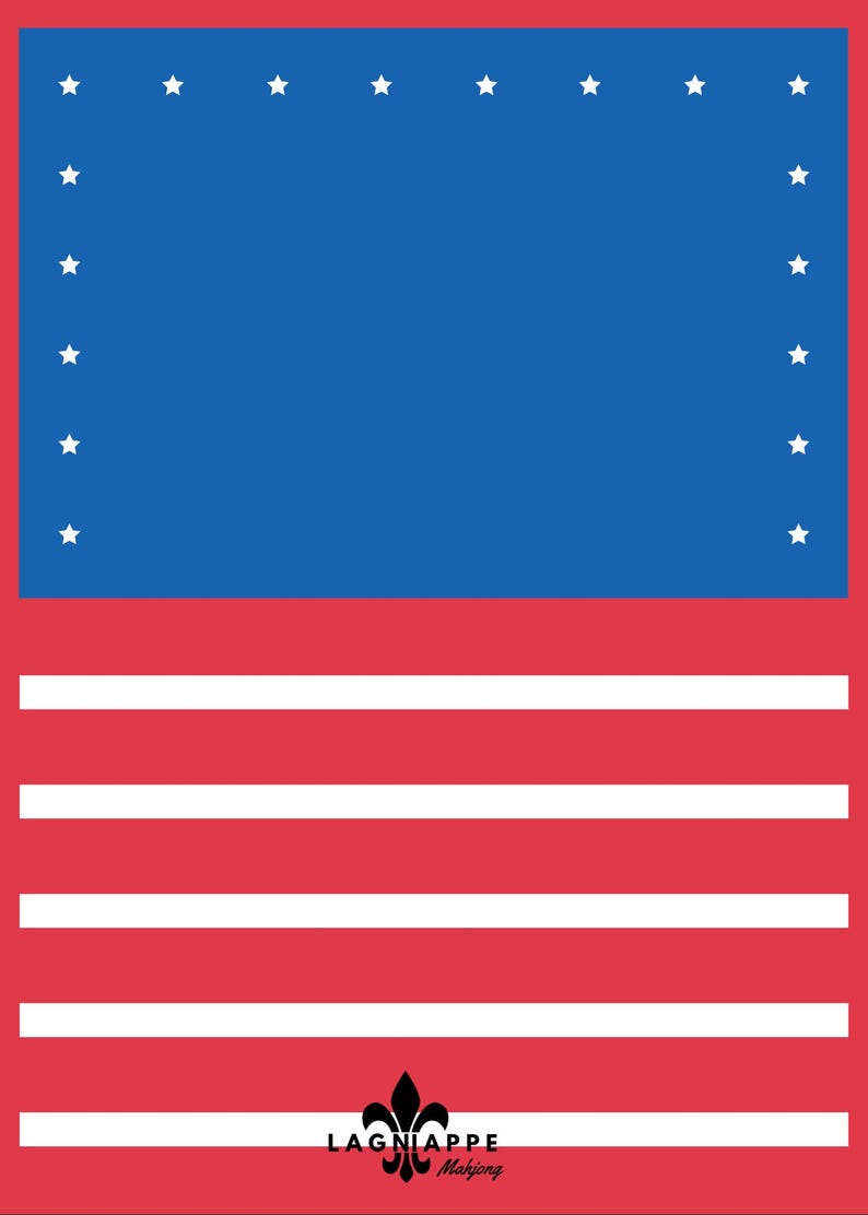 May include: A patriotic design featuring a blue rectangle with white stars and red and white stripes. The image has a red border and the text "LAGNIAPPE Mahjong" at the bottom.