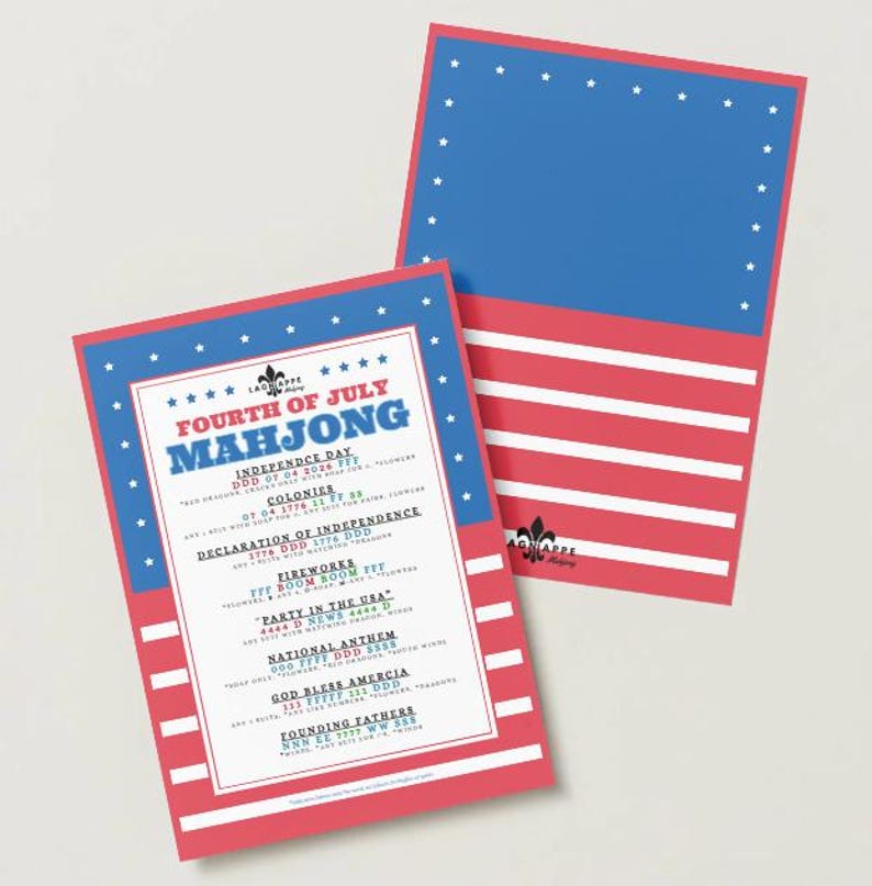 May include: Two Fourth of July Mahjong game cards. The cards have a red and white striped bottom and a blue top with white stars. The front card has the text "Fourth of July Mahjong" and other related text.