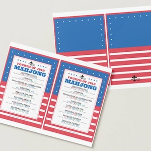May include: Two Fourth of July Mahjong game sheets with a red, white, and blue color scheme. The sheets feature the text "Fourth of July Mahjong" and a list of related events. The design incorporates stars and stripes.