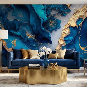 May include: A modern living room with a blue velvet sofa, gold coffee table, and two armchairs. The wall features a large abstract mural in shades of blue, gold, and white. A floor lamp and curtains complete the stylish decor.