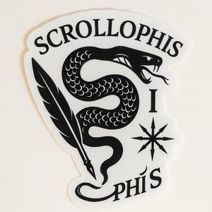 May include: A black and white sticker featuring a stylized snake, quill, starburst, and the text "SCROLLOPHIS I PHIS". The snake is coiled with a forked tongue. The quill is positioned to the left of the snake.