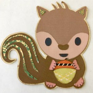 May include: A brown and green squirrel with a large, bushy tail holds a yellow and orange acorn in its paws. The squirrel has a pink nose and large, black eyes.